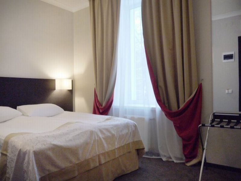 Optima Collection Kharkiv Hotel Стая снимка