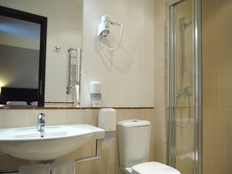Optima Collection Kharkiv Hotel Стая снимка