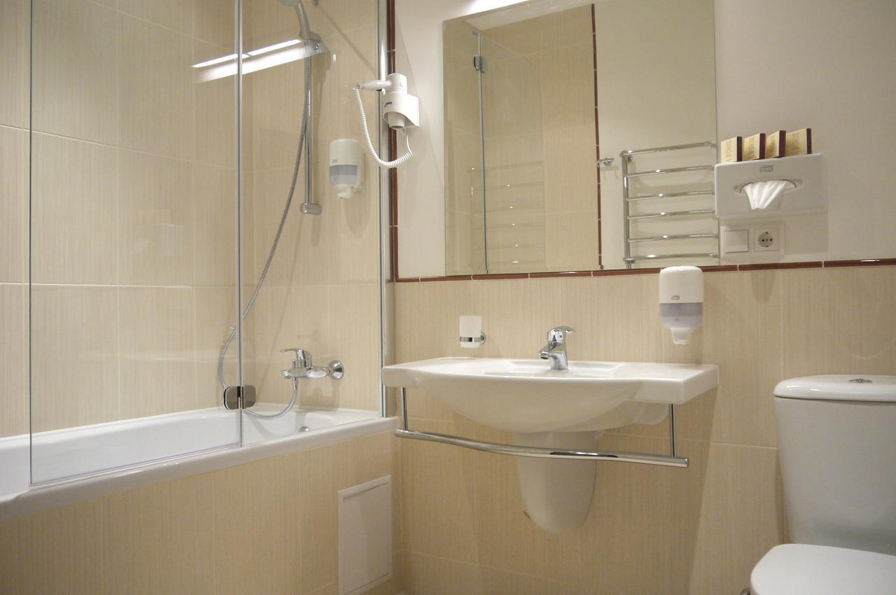 Optima Collection Kharkiv Hotel Стая снимка